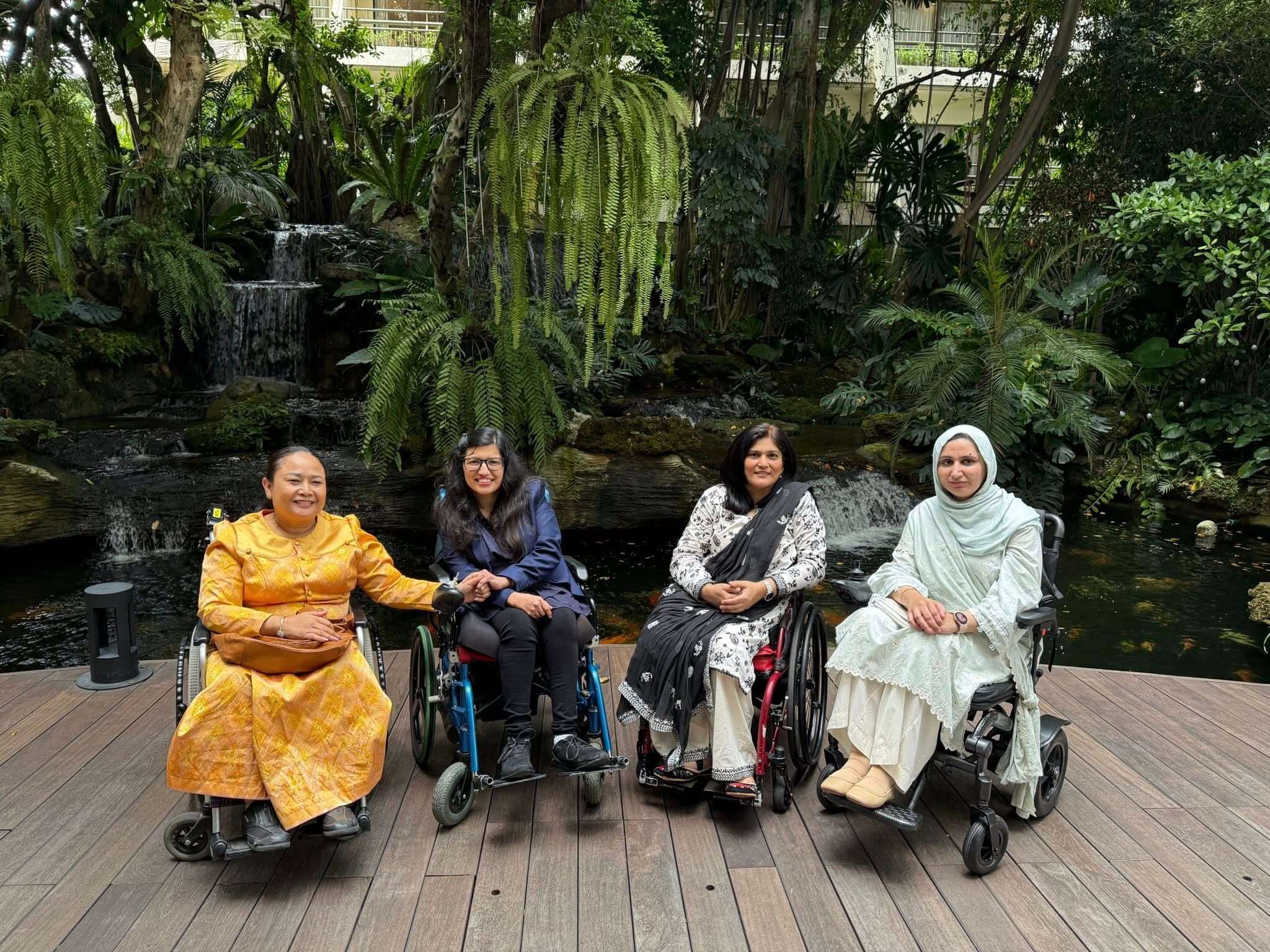 Group of women seated on chairs participating in the Special Talent Exchange Program session